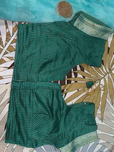 Stunning Teal Blue Saree with Gold Accents