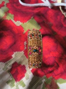 Ornate Gold Bangle with Gemstones