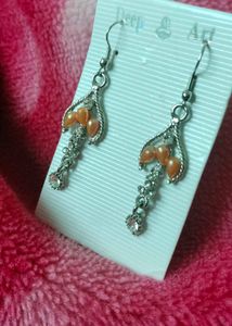 Brand new Elegant Drop Earrings with Orange Beads