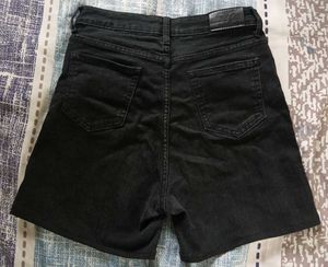 Black denim shorts