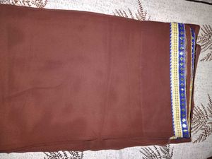 Elegant Brown Saree with Intricate Border