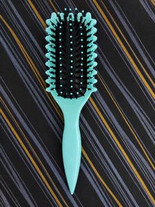blueish aqua Paddle Hair Brush.