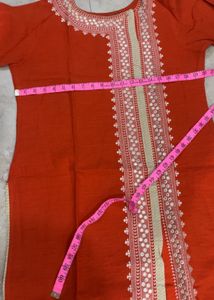 Elegant Orange Kurta with Intricate Embroidery