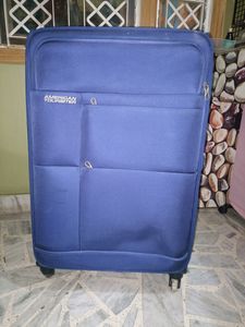 American Tourister Blue Suitcase
