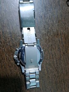 FOSSIL SILVER CHAIN WATCH WITH BLUE DIAL.
