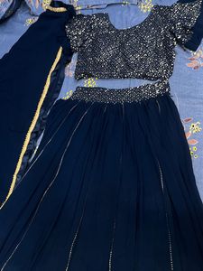 Stunning Teal Embellished Lehenga Choli