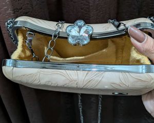 Elegant Embossed Clutch with Chain Strap