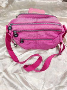 Pink Kipling Crossbody Bag with Monkey Charm