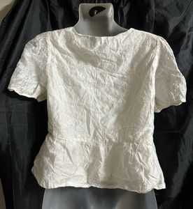 Embroidered White Peplum Blouse