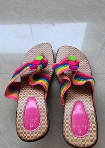 Vibrant Rainbow Flip Flops