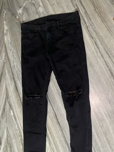 black distressed jeans