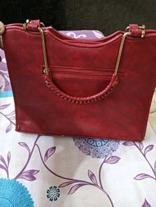 Stylish Teal Handbag with Gold Accents