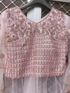 Baby Pink Peplum Top, Lahanga And Dupatta .