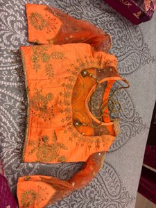 Stunning Orange Embroidered Lehenga Choli
