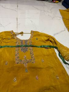Exquisite Yellow Kurta with Intricate Embellishmen