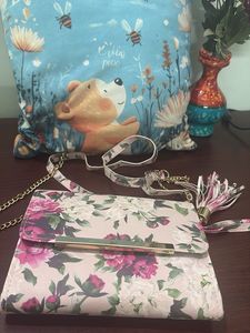 Floral Clutch with Tassel Detail