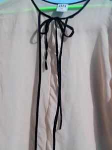 Vero moda Sheer Beige Blouse with Black Trim.