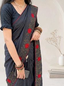 Elegant Black Saree with Red Floral Embroidery