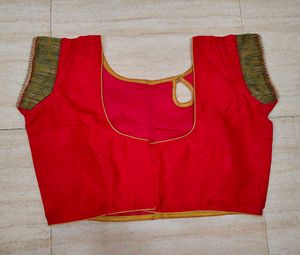 Rani Pink Embroidered Saree with stitched blouse