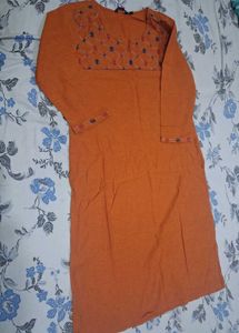 Elegant Rust Orange Kurta with Subtle Embroidery