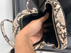 MANGO Round Snake Print Crossbody Bag