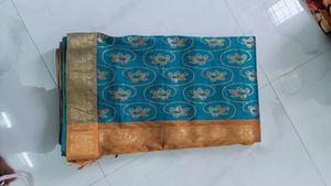 Elegant Teal Saree with Gold Motif