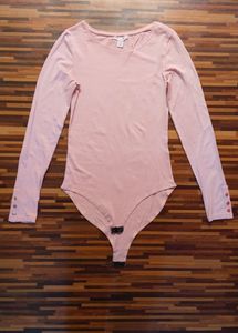 Peach Full-Sleeve Bodysuit by Amisu