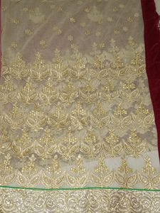 Maroon N Golden Colour Full Party Wear Net Saree With Beautiful Golden Border