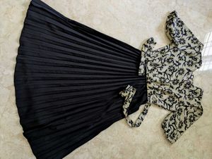 Elegant Pleated Skirt & Printed Blouse Set