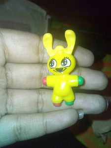 Vintage Toy Character with Wheels
