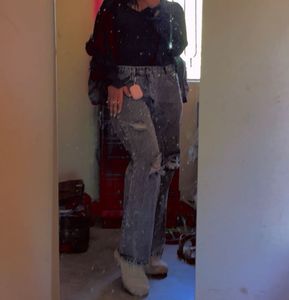 Acid washed distressed black oversized jeans