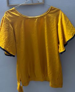 Chic Yellow Top with Black Trim