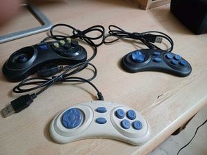 3 video game remote and 8 in 1 Cassettes