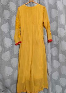 Yellow long Anarkali-style gown