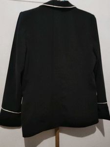 Chic Black Blazer with White Piping