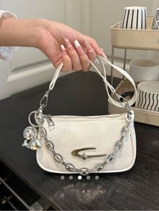 Chic White Shoulder Bag with Charms