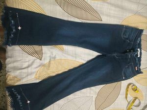 Blue Denim Flare Jeans with Frayed Hem