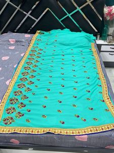 Elegant Teal Embroidered Saree
