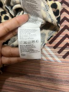 Leopard design top high neck