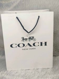 Coach Moon coffee brown with charm 🤎