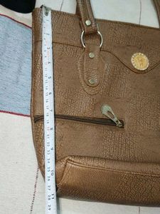 Stylish Brown Textured handbag Bag