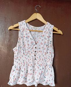 Chic Floral Smocked Peplum Top
