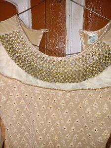 Elegant Beige Kurta with Embellished Neckline