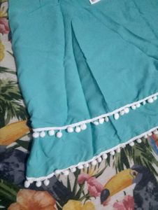 Chic Teal Top with Pom Po