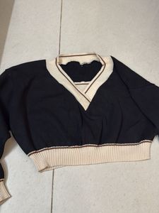 Navy V-Neck Sweater with Cream Trim