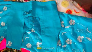 Sky blue saree with silver thread work.