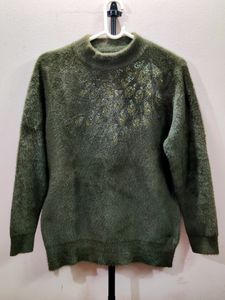 Imported women's fuzzy knit sweater with a high ne