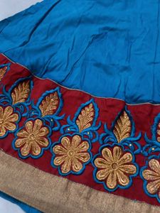 Elegant Blue Kurti with Intricate Gold Embroidery