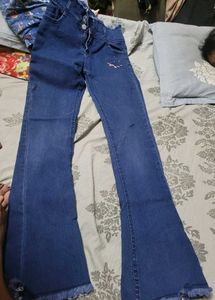 Blue Flare Jeans with Frayed Hem