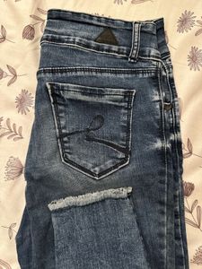 Distressed Wash Jeans